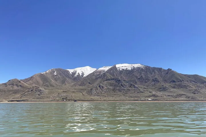 View of a mountain range with some snow from the Great Salt Lake.
